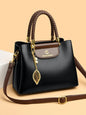 BAIKHIJU Luxury Leather Handbag for Women | Braided Handles & Gold Leaf Charm