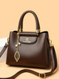 BAIKHIJU Luxury Leather Handbag for Women | Braided Handles & Gold Leaf Charm