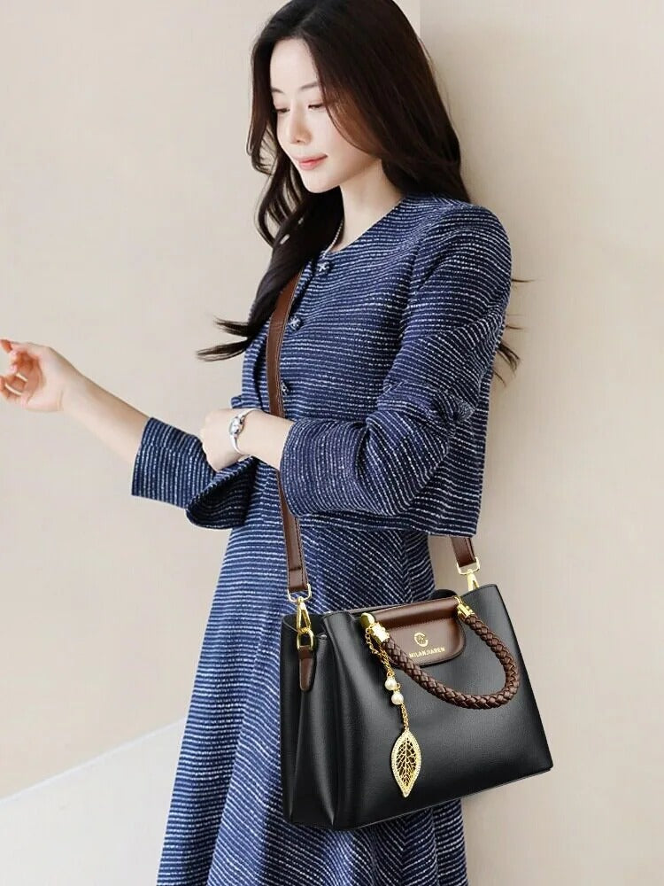 BAIKHIJU Luxury Leather Handbag for Women | Braided Handles & Gold Leaf Charm